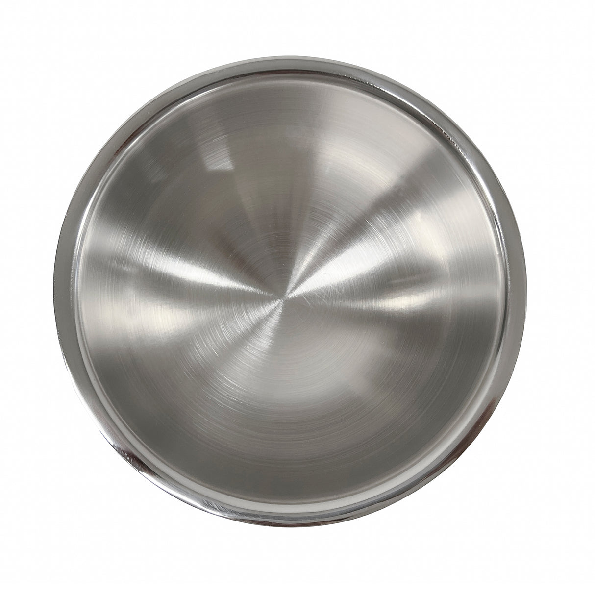 A shiny, empty Remington Collection stainless steel bowl viewed from above, featuring a circular, brushed metal texture and smooth rim against a white background.