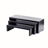 A set of three black rectangular nesting tables, part of the TableCraft Products nesting set, each fits under the next largest. The tables feature clean, straight edges and are displayed on a white background.