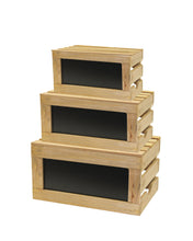 Three rectangular rustic risers crate set pieces, made from natural wood with slatted sides and solid black front panels, are stacked from largest to smallest. Each nesting crate set features handle cutouts. The background is plain white.