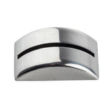 A shiny, curved TableCraft card holder made of stainless steel with a smooth surface and a horizontal slot across its front. The silver object is photographed on a white background from a slightly low angle.