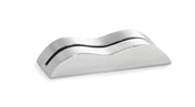 A sleek, metallic, wave-shaped card holder made of stainless steel with a reflective surface and a thin horizontal slot along its curved top, placed on a white background. The object has smooth edges and resembles a modern, minimalist desk accessory.
