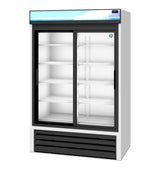 A large refrigerated merchandiser with two sliding glass doors, white sides, and multiple empty shelves. The reach-in unit features a black vent at the bottom, a blue and white illuminated sign panel on top, and a brightly lit interior.