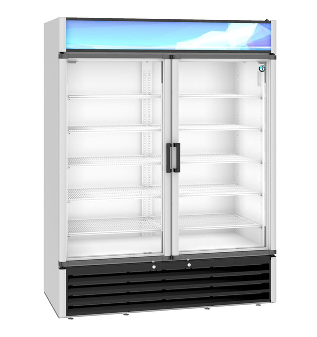 A commercial refrigerated merchandiser with two clear sliding doors, a white interior, and multiple adjustable shelves. The top features a blue and white lighted panel, while the bottom section includes black ventilation grilles. The unit is empty.