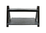 A two-tiered black metal rack from the TableCraft Products Frostone Collection, featuring two flat rectangular shelves supported by four angular legs, photographed against a plain white background. The riser set has slightly uneven surfaces.