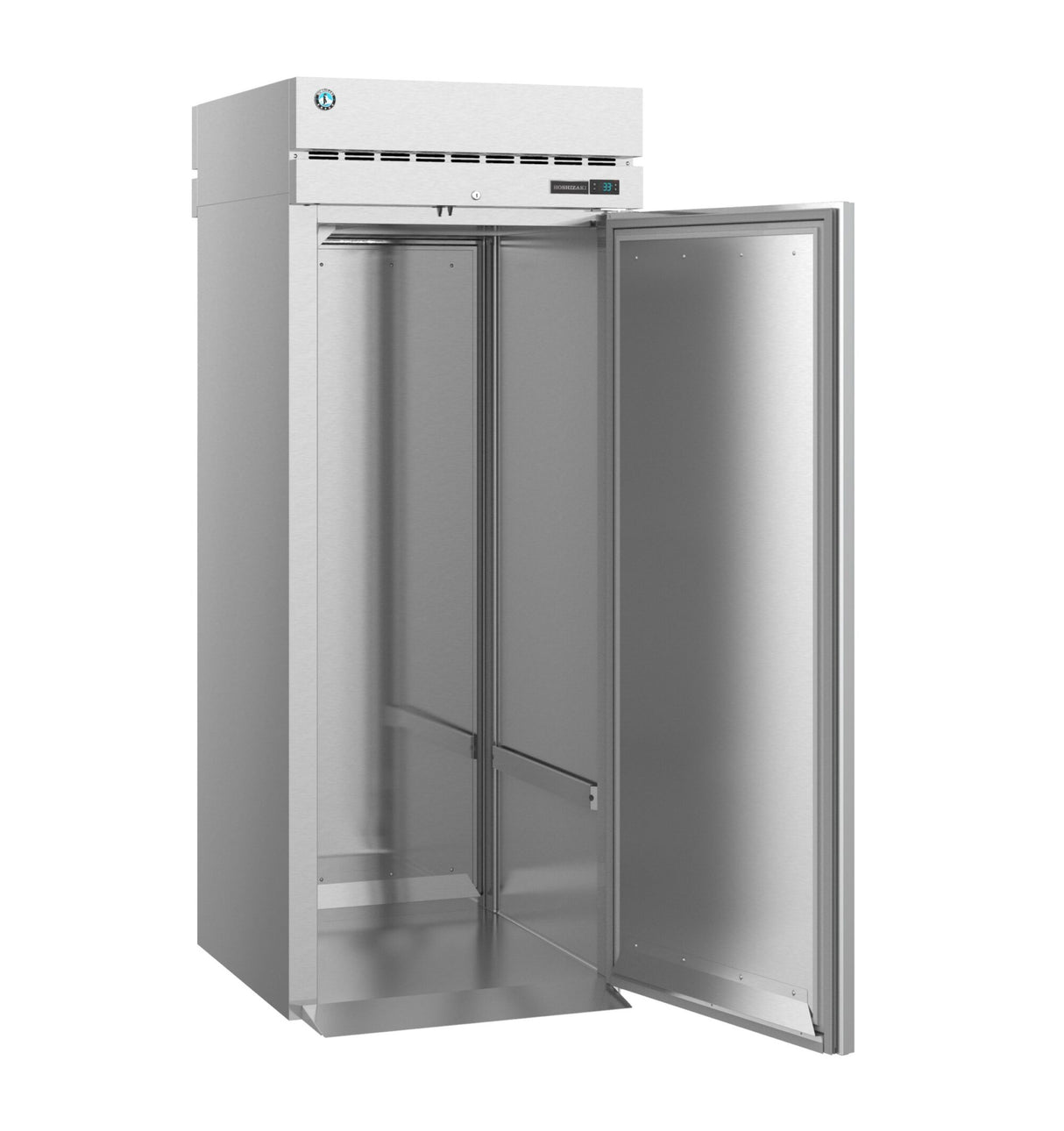 A tall Steelheart Series Refrigerator stands with its single door open, revealing an empty stainless steel interior. The sleek roll-in refrigerator features smooth metal walls and modern ventilation grilles near the top.