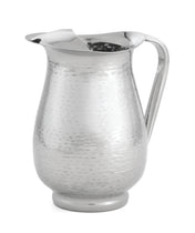 A shiny, hammered stainless steel beverage pitcher with a 2 qt capacity features a wide spout and curved handle. Its rounded body and slightly flared base create a classic, elegant appearance against the white background.