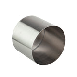 A brushed stainless steel cylindrical ring with a smooth, reflective finish, positioned on its side against a white background. The hollow tube is both dishwasher safe and ideal as part of a riser set for versatile use.
