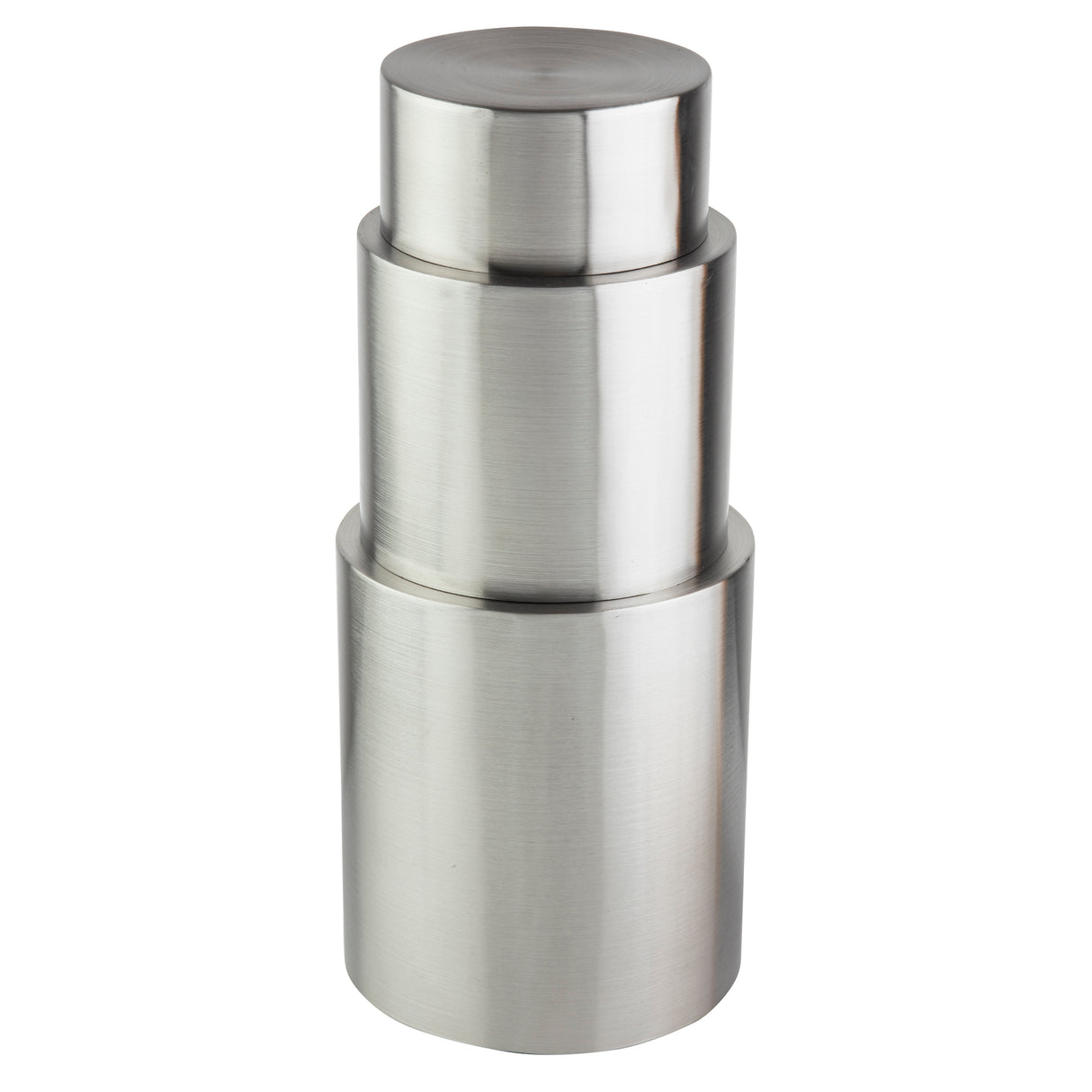 A stack of three brushed stainless steel containers forms a sleek, modern riser set with round, flat lids. Arranged from smallest to largest, the cylindrical tower features a matte metallic finish and smooth texture.
