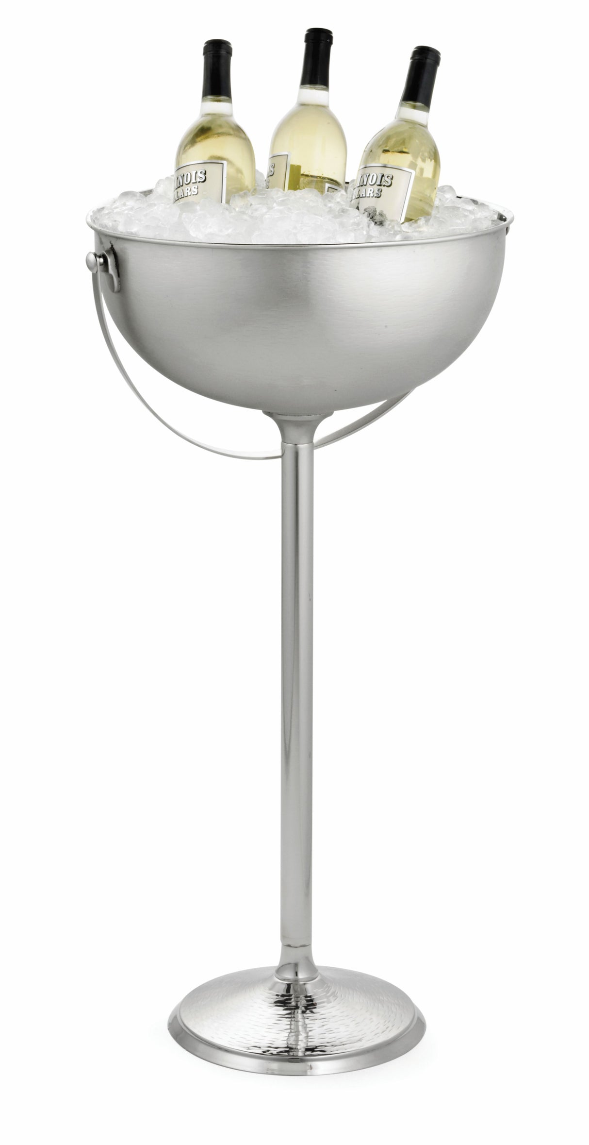 A tall, stainless steel champagne bucket filled with ice holds three upright bottles of white wine. The bucket stands on a slender stem with a round, sturdy base—a stylish Remington Collection beverage stand for elegant chilling at events or parties.