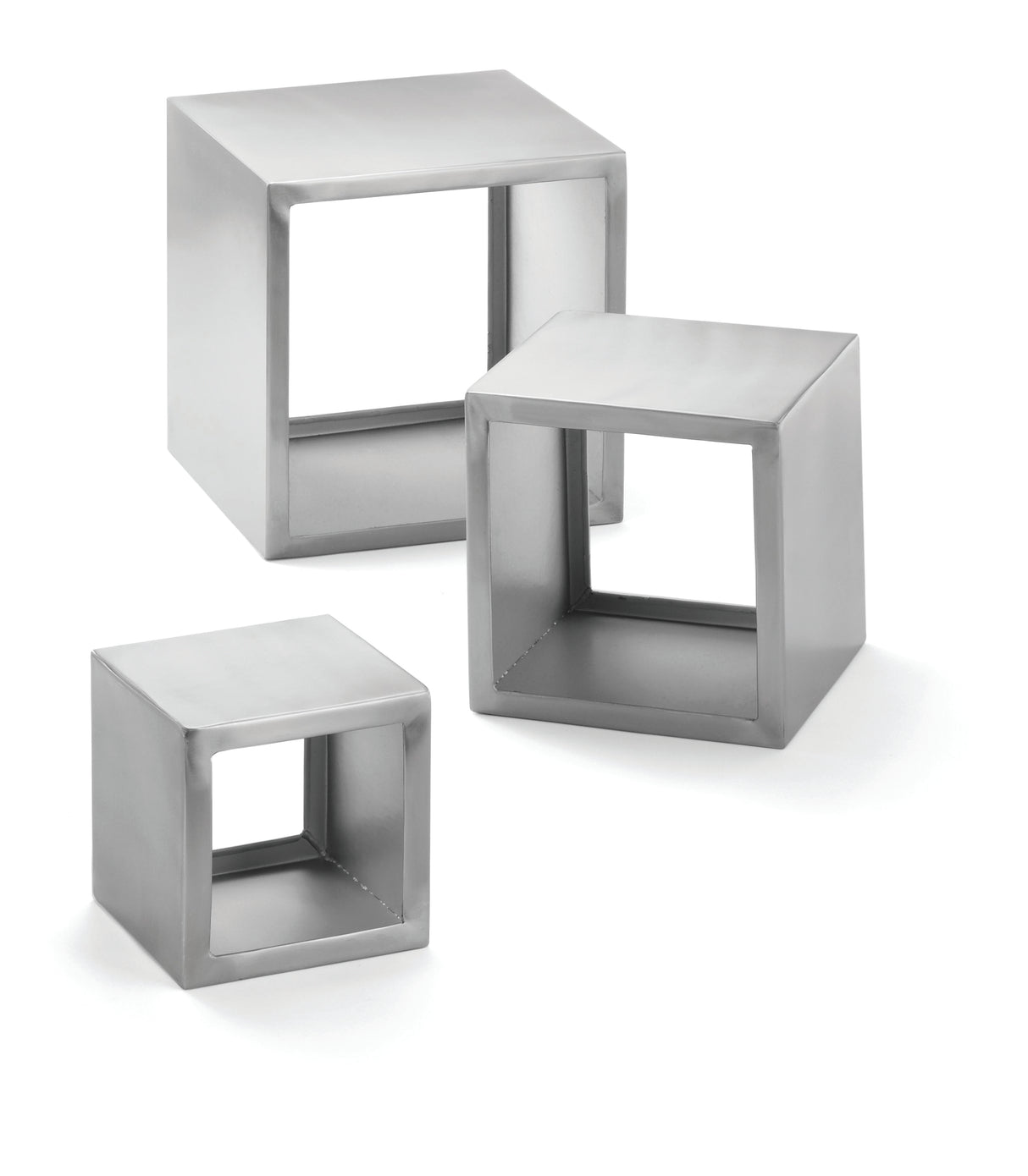 Three hollow, cube-shaped frames in brushed stainless steel form the Barclay Riser Set. With clean, smooth edges and open faces, these modern, minimalist cubes are grouped together on a white background.