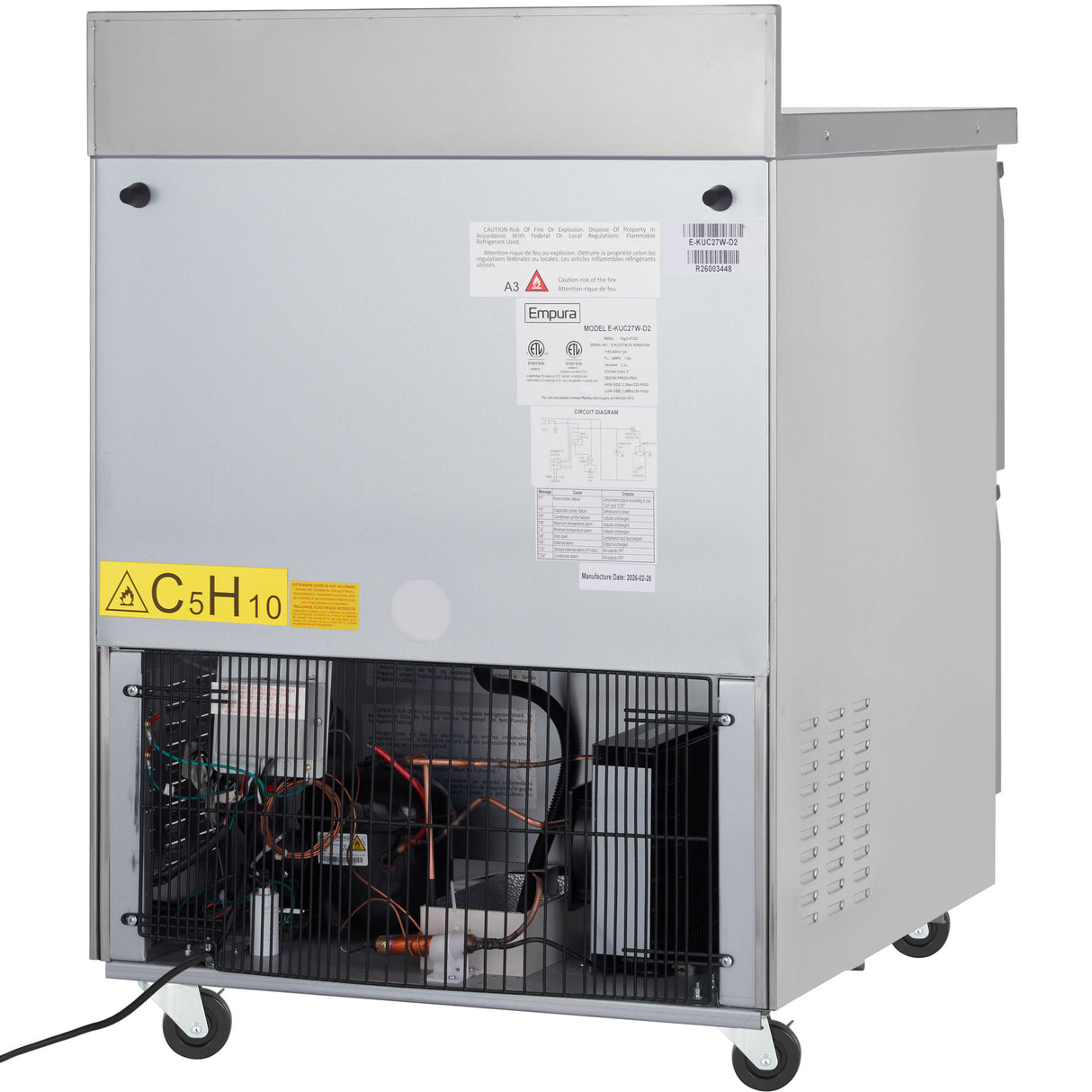 A commercial Empura Refrigeration ice machine on caster wheels, showing its back side. The metal panel is partly open, revealing internal wiring and components. Labels and technical stickers are visible on the stainless steel surface.