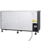 A large rectangular Empura Refrigeration unit with a stainless steel front panel, black trim, four caster wheels, and a visible motor and electrical cord on the lower right. Warning and information labels are affixed to the upper right corner.