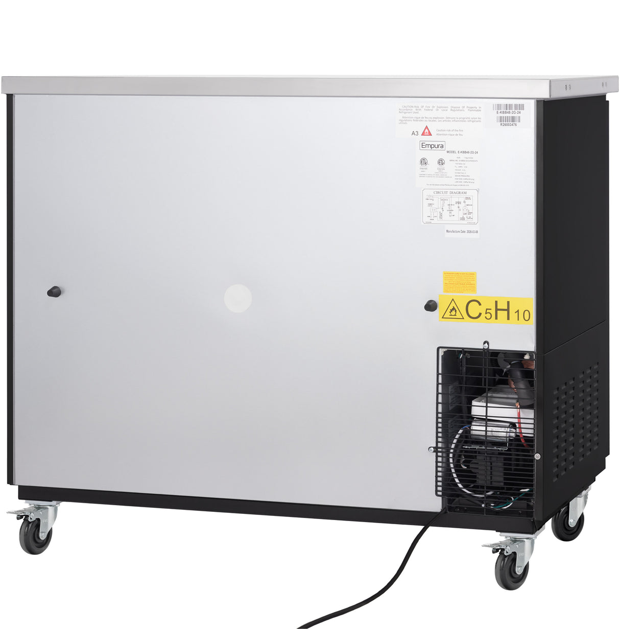 A large, silver and black Empura refrigeration appliance on four caster wheels. A ventilation grate and compressor are visible on the bottom right. Warning labels, including one with “C5H10,” and informational stickers are on the metal panel.