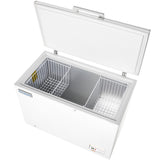 A white commercial kitchen freezer with the lid open reveals a spacious interior and two removable wire baskets. The inside, lined with gray insulation, features a control panel with indicator lights and a small lock on the solid lid freezer.