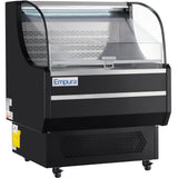 A black Empura refrigeration display with curved glass front and lit interior. This refrigerated display case has metal shelves, bottom vents, and wheels for mobility—ideal for showcasing chilled food or drinks in a store or cafe.