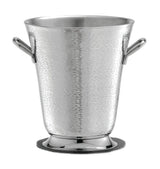 A shiny, hammered stainless steel bucket with rounded handles sits on a circular base. Part of the Remington Collection Bucket line, it features a textured, reflective finish and is dishwasher safe for easy cleaning.