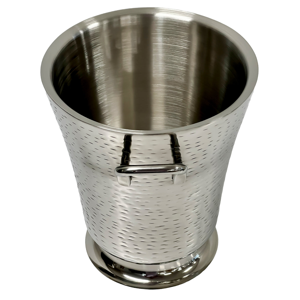 A Remington Collection Bucket, this stainless steel ice bucket features a tapered shape, textured surface, and small handle. Dishwasher safe and set against a white background, its reflective metal shows light distortions while the bucket remains empty.