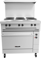A stainless steel Vulcan restaurant range featuring six black electric French hotplates, six control knobs, an oven below with a handle, ventilation slots, two smaller side knobs, four caster wheels, and the brand name “Vulcan” on the front.