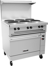 A commercial stainless steel Vulcan restaurant range with six round French hotplates, four control knobs, an oven below with a handle, a vented backsplash, and wheels for mobility. The Vulcan brand name is visible on the oven door.