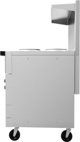 A side view of a modern, silver, wheeled food service cart with two round French hotplates on top and a raised back panel. The cart has black caster wheels and a minimalist, industrial design against a plain white background.