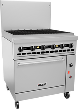 A commercial stainless steel Vulcan restaurant range with six control knobs, a spacious grill top, lower oven door, caster wheels, and backsplash. The sleek industrial design features a front panel with logo and indicator lights.