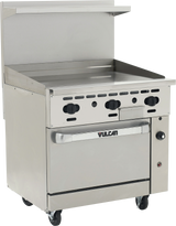 A sleek, industrial Restaurant range with a flat griddle top, four black control knobs, an oven door labeled "Vulcan," rear backsplash, sturdy wheels for mobility, and a handy shelf above the cooking surface—a perfect fit for any professional kitchen.