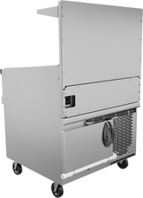 A stainless steel commercial kitchen appliance on wheels, with a vented panel, coiled power cord, pipe, and raised shelf. This restaurant range features a smooth metallic surface and durable design for mobility and heavy-duty use.