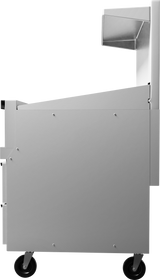 Side view of a modern, gray metal utility cart with four black wheels. Ideal for use alongside a restaurant range or gas griddle, the cart features a flat top, raised side compartment, and several panels secured by visible screws. Plain white background.