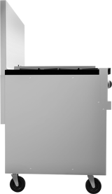 Side view of a sleek, modern stainless steel grill cart with a charbroiler on two black wheels, featuring a closed lid and two large control knobs. The minimalist, boxy design includes clean lines and visible panel screws.