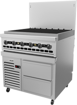 A commercial-grade stainless steel gas grill with six black control knobs, a large charbroiler grilling surface, a vented backsplash, and two lower drawers. The unit is on wheels and features a digital temperature display on the front lower left side.