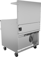 A commercial stainless steel food cart with a refrigerated base on four wheels, featuring a vented cooling unit, coiled power cord, horizontal white pipe, and upper shelf, viewed from the back and side against a plain background.