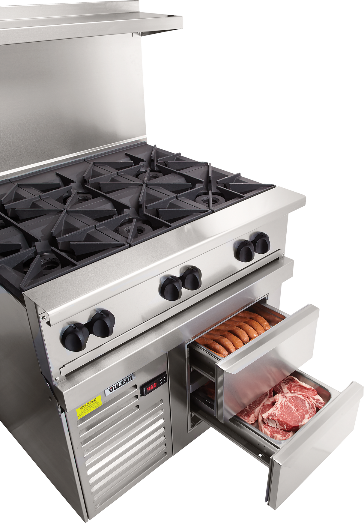A large commercial kitchen featuring a restaurant range with gas burners and meat stored in the refrigerated base.