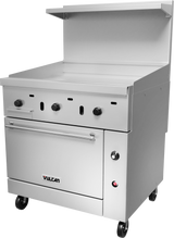 A commercial stainless steel restaurant range with a flat griddle top, three control knobs, a gas oven below, a shelf above, and four wheels for mobility. The unit is labeled “Vulcan” and appears clean and industrial.