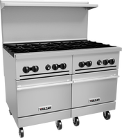 A large, stainless steel restaurant range with eight gas burners, black control knobs, two oven doors, a backsplash, and wheels for mobility. The brand name “Vulcan” appears on each oven door of this commercial unit.