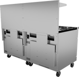 A stainless steel restaurant range with wheels, flat panels, and vented sections. The right side reveals a stovetop with burners, while the back and sides feature mounting brackets and a shelf above in a clean, professional kitchen environment.