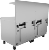 A large, industrial stainless steel cart with two compartments, side panels, and vented sections—ideal for use alongside a restaurant range or thermostatic griddle. It has four wheels for mobility, a flat top surface, and a raised back panel in a modern design.