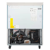 Back view of an Empura Freezer showing a metal panel with labels and warnings, above a mesh compartment revealing electrical wiring, coiled tubing, and a black compressor unit. This commercial freezer is mounted on wheels for mobility.