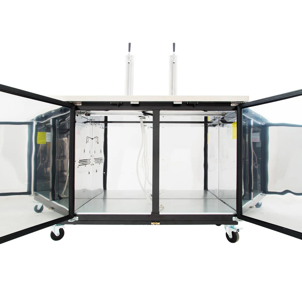 A stainless steel Empura Refrigeration Direct Draw Beer Dispenser with two open transparent doors reveals an empty interior. Two beer tap handles sit on top, and four caster wheels add mobility. Inside, tubing and reflective surfaces are visible.