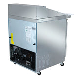 A stainless steel Empura refrigeration mega top prep table on wheels with a vented lower section, visible compressor components, side vents, control panel, and top work surface. Labels and a paper with specifications are attached to the side.