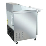 A stainless steel Empura refrigeration unit on wheels, featuring a vented panel, side door with vertical handle, visible electrical components at the bottom left, and an angled mega top prep table with a small side shelf.