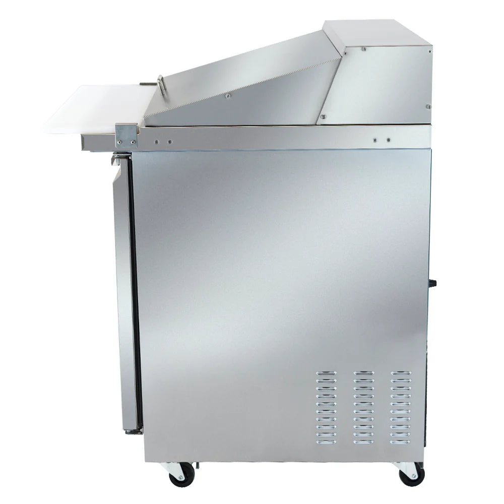 A commercial stainless steel mega top prep table on wheels, shown from the side. It has a raised-back work surface, a lower compartment for Empura refrigeration, ventilation slots below, and a white cutting board extending from the front.