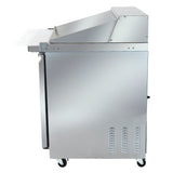 A commercial stainless steel mega top prep table on wheels, shown from the side. It has a raised-back work surface, a lower compartment for Empura refrigeration, ventilation slots below, and a white cutting board extending from the front.