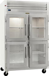 A large commercial stainless steel reach-in refrigerator with four glass doors, metal handles, adjustable wire shelves, wheels at the base, and a digital temperature display on the upper left corner. This ENERGY STAR unit’s interior is empty and well-lit.