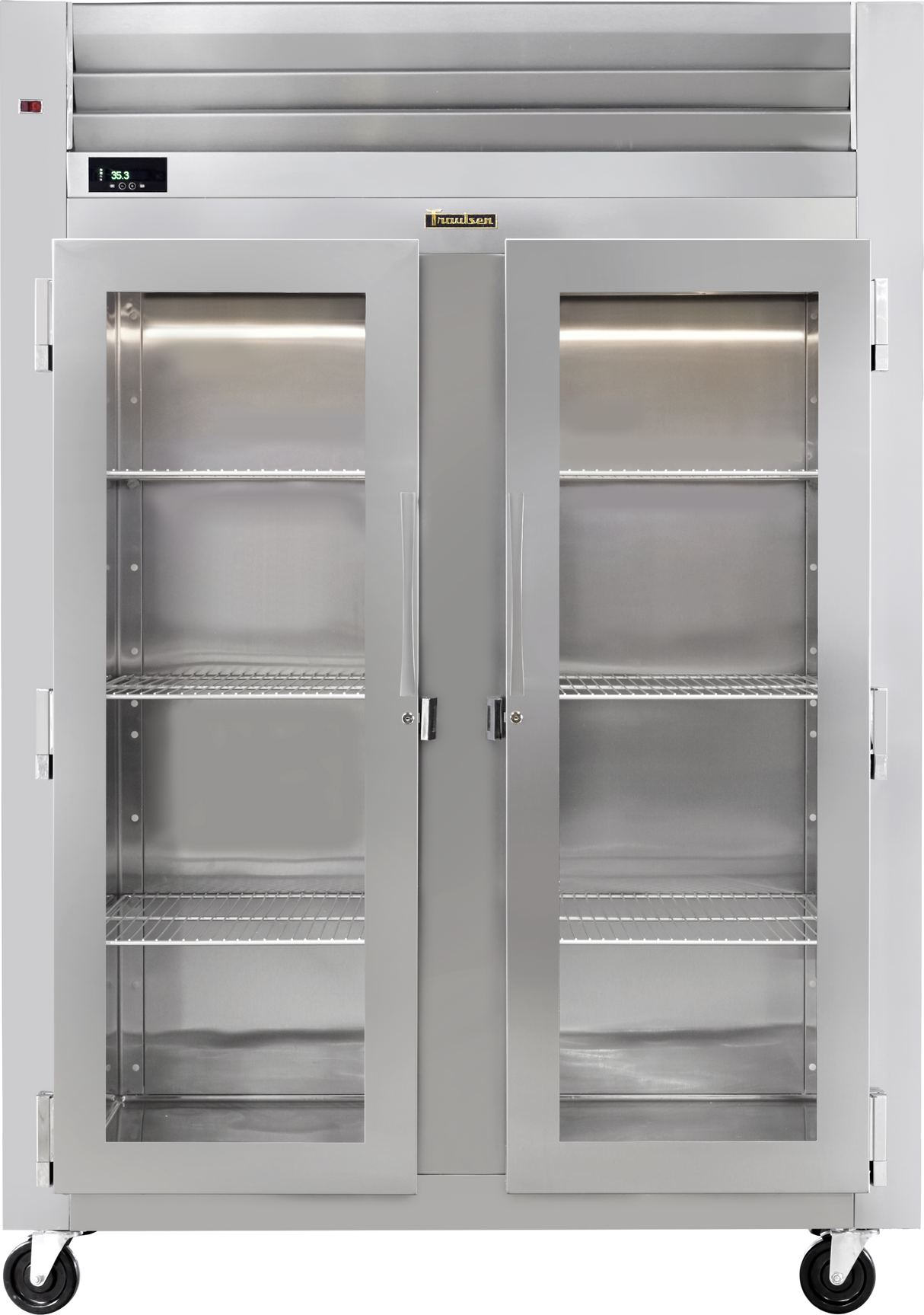 A Traulsen Spec-Line Reach-in Display refrigerator features two clear glass doors, three adjustable wire shelves per side, a digital temperature display on the top left, and four wheels for easy mobility. The well-lit stainless steel interior is empty.