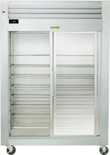 A large, stainless steel Spec-Line Refrigerator with transparent sliding glass doors. This reach-in display unit features empty wire shelves, stands on four wheels, has a digital temperature display, and includes a vented panel at the top.