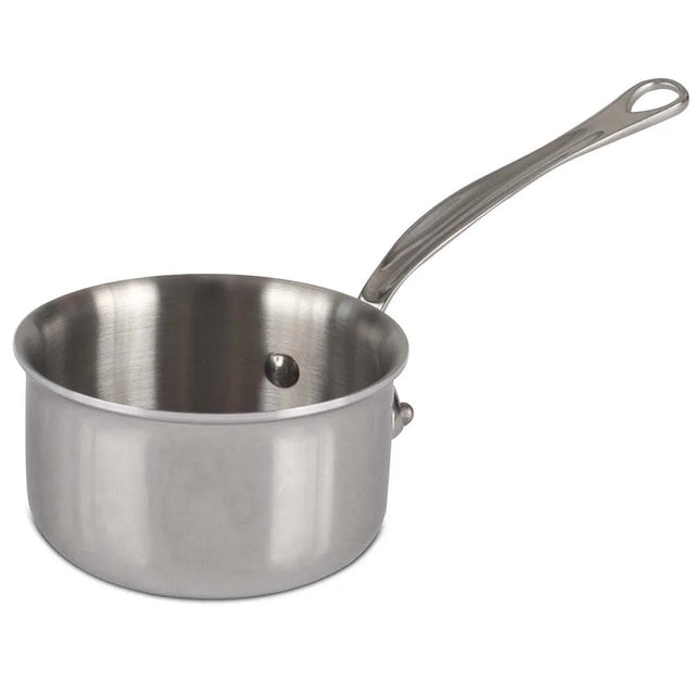A stainless steel sauce pan with a shiny, smooth surface, a long handle featuring a hanging hole, and a small pouring spout on the rim. This oven safe sauce pan sits elegantly on a white background.