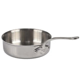A Mauviel M'Cook Sauce Pan with straight sides and a long, sturdy handle attached by rivets. This stainless steel sauce pan features a shiny interior, brushed exterior, and is oven safe. The pan sits on a white background.