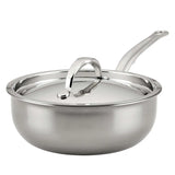 A shiny Hestan Nanobond Saucier pan from JB Prince, 2.0qt, with high sides and a polished stainless steel finish. The long curved handle and matching lid add to its sleek look, reflecting light off their smooth surfaces.