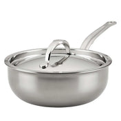 A shiny Hestan Nanobond Saucier pan from JB Prince, 2.0qt, with high sides and a polished stainless steel finish. The long curved handle and matching lid add to its sleek look, reflecting light off their smooth surfaces.