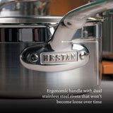 Close-up of a shiny stainless steel Hestan Probond Saucepan showing the ergonomic handle attached with dual rivets. The handle, engraved with HESTAN, ensures a secure grip and lasting durability—perfect for any covered saucepan or 3.0qt saucepan need.